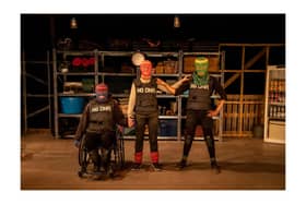 Jess (left), 'Chopin' (centre) and Charmaine (right), in their knitted masks and bullet proof vests. Credit: Ro Murphy