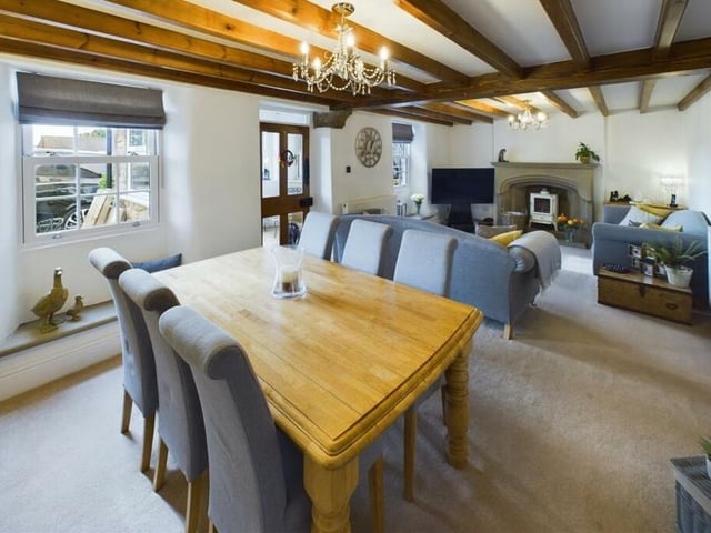 The full dining room through to lounge.