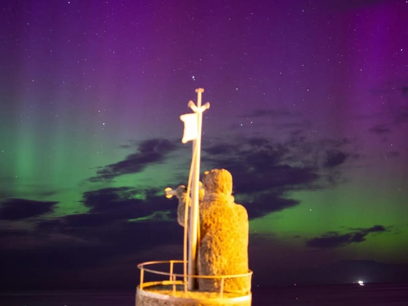 Skipper Dora is framed by the stunning lights on West Cliff, Whitby.