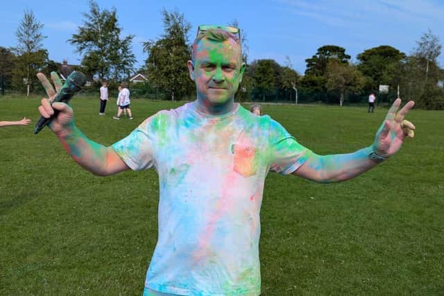 Headteacher (Shaun Hopper) gets in on the act after parents raised £350 in a jar!