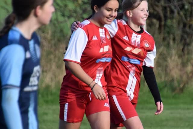 Scarborough Ladies U13s celebrate their goal at Mavericks. Photo by Sarah Farrar
