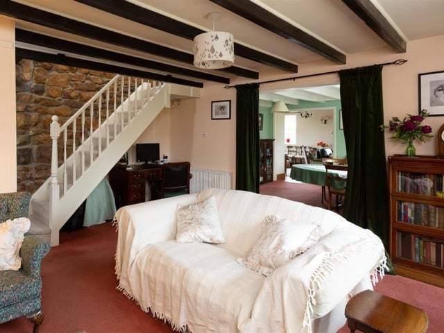 Beamed rooms and open stonework to the walls add to the character of this stunning property.