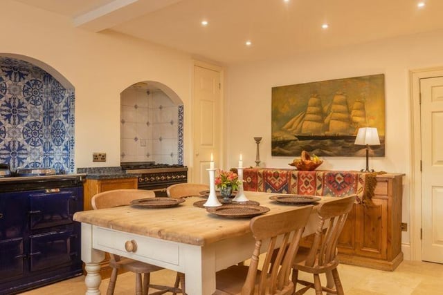 An inviting and well equipped kitchen with diner.