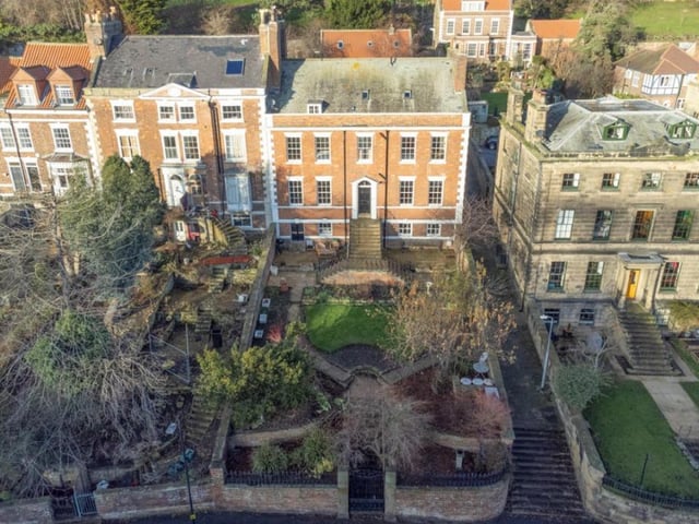 An overview of the property and its garden and surroundings.