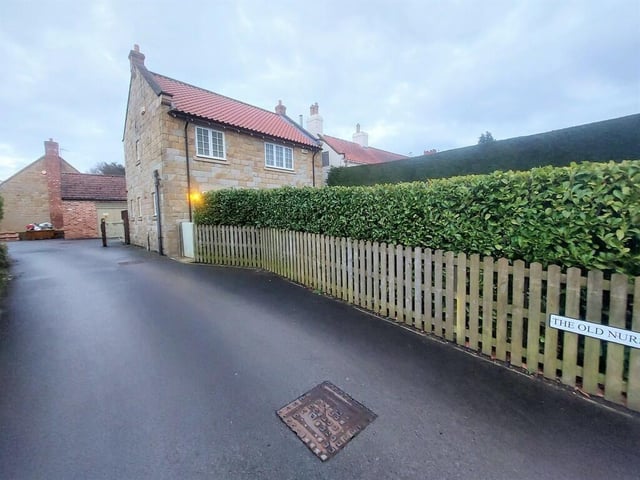 The property has a quiet location despite being in the heart of the village.