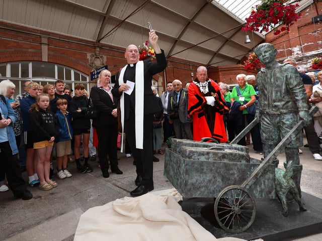 During the blessing of the sculpture.