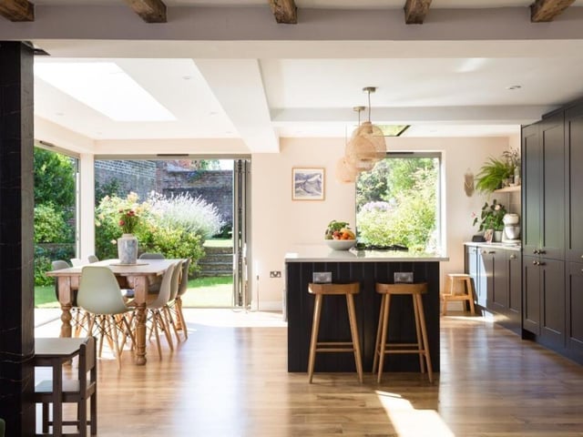 The open plan living kitchen has bi-fold doors to two aspects, leading to patio space and the south facing garden.