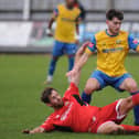 Pete Davidson slides in against Stocksbridge Park Steels.