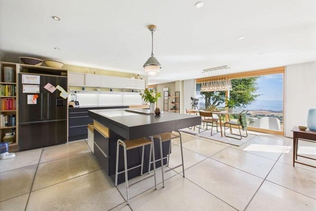 Glazing reveals spectacular views from the living kitchen.