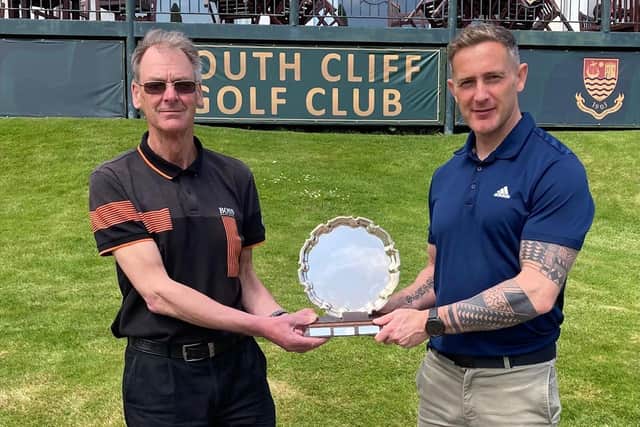 Rabbit Captain Barry Skipper, left, presents the Rabbit Captain's Prize to winner Shane Corcoran.