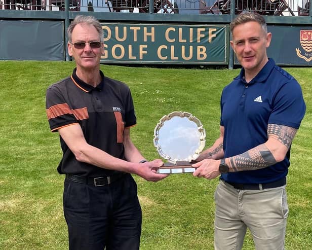 Rabbit Captain Barry Skipper, left, presents the Rabbit Captain's Prize to winner Shane Corcoran.