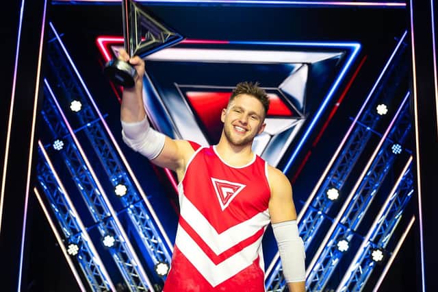 Scarborough's Joe Fishburn lifts the Gladiators trophy - Image courtesy BBC