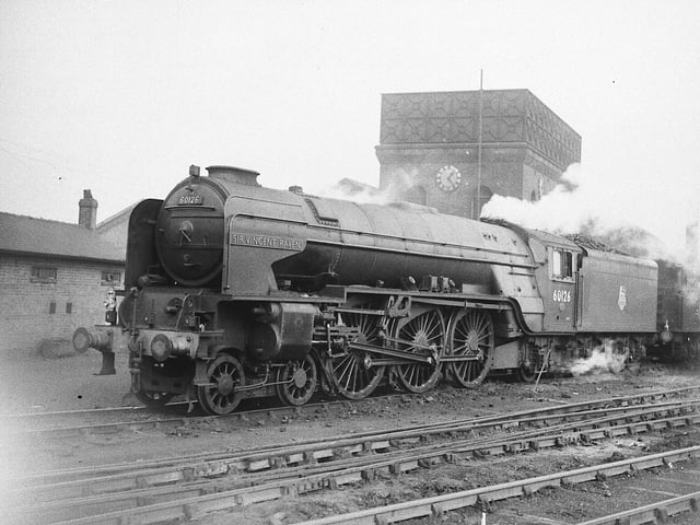 Pacific A1 No. 60126 "Sir Vincent Raven". The clock on the water tower shows 1.25pm. November 17, 1951.