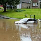 Car marooned in flood water in Scalby, near Scarborough, this morning.