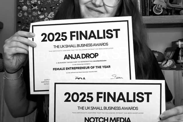 Anja with her finalist certificates