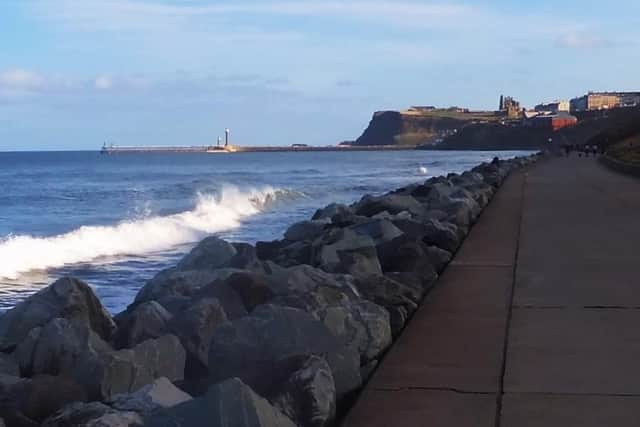 The path along Whitby seafront, looking towards town.