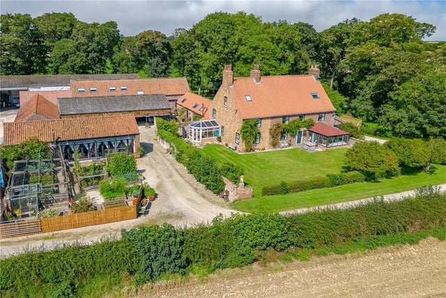 This detached house is for sale with Carter Jonas with a guide price of £1,500,000.