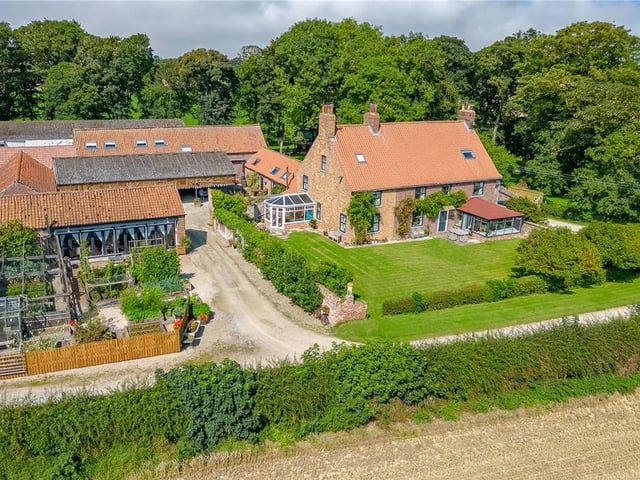 This detached house is for sale with Carter Jonas with a guide price of £1,500,000.