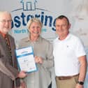 Foster carers John and Karen Pownall with North Yorkshire Council’s placement and fostering manager, Alan Tucker, at an annual conference earlier this year after being recognised for the rewarding work they do.