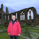 Sir Tony Robinson at Whitby Abbey.