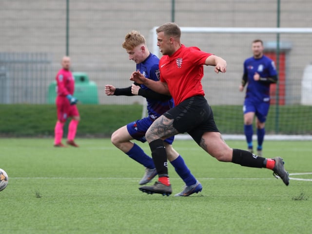 Two players battle it out in the Division 4 match.