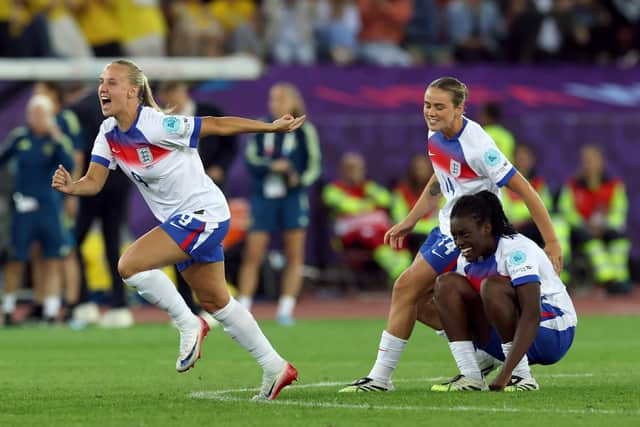 Beth Mead, Grace Clinton and Michelle Agyemang of England celebrate after England beat Sweden in the EURO 2025 quarter-final. Photo by Eddie Keogh/Getty Images