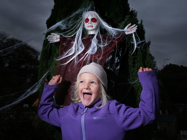 A little girl having fun at the attraction.