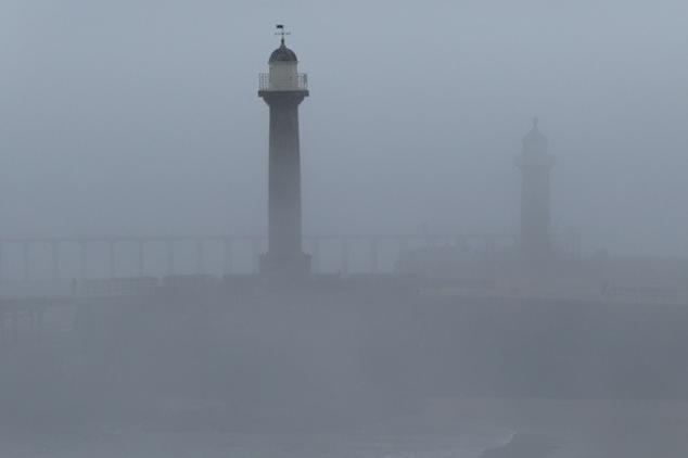 Thick sea fret shrouds Whitby harbour.
picture by Keith Willday.