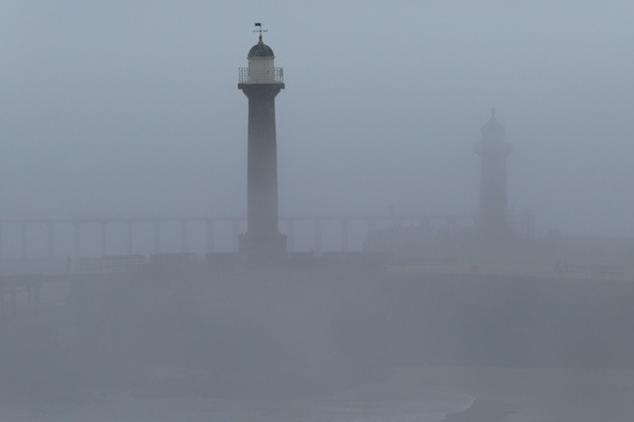 Thick sea fret shrouds Whitby harbour.
picture by Keith Willday.