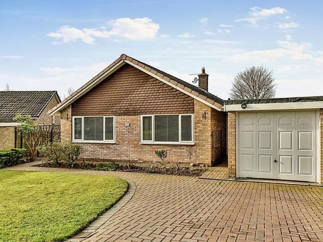 This three bedroom and two bathroom bungalow is for sale with Reeds Rains for £350,000.