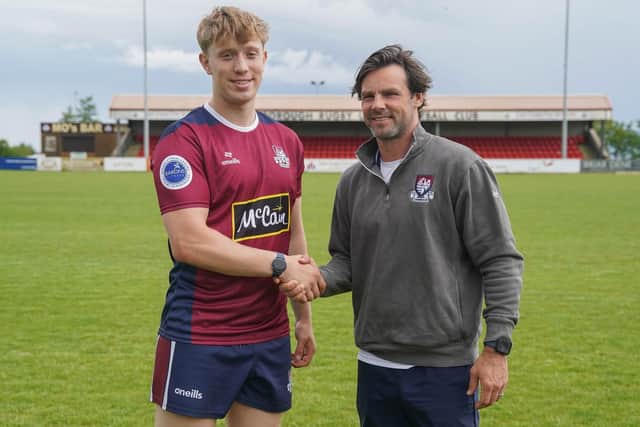 Scarborough RUFC Head Coach, right, welcomes Seth Bodill to Silver Royd. Photo by Charlie Hopper