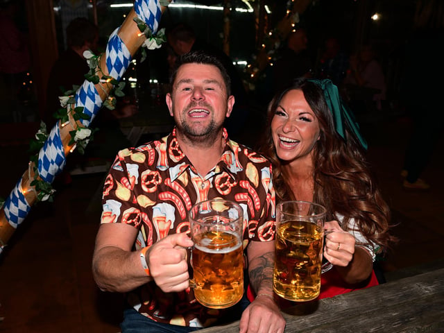 All smiles and steins. Picture: Richard Ponter