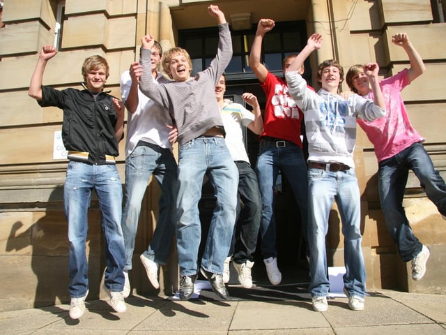 Students from Whitby Community College jump for joy as they receive their GCSE results.