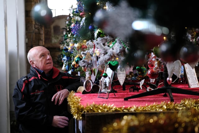 Stephen Clarke enjoys the exhibits at St Mary's Church.
picture: Richard Ponter, 225201k