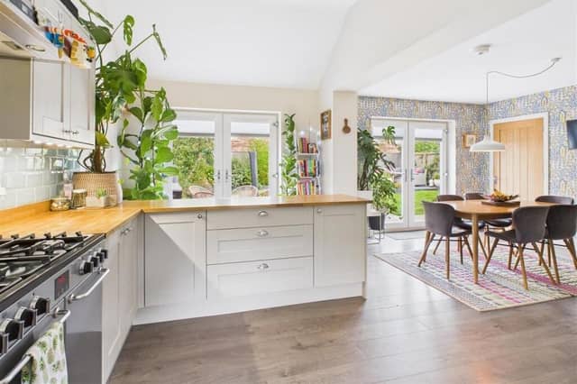 The property's open plan living arrangement, with doors out to the garden.