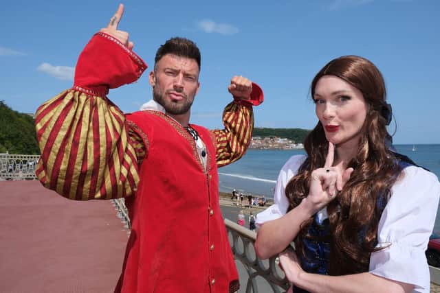 Jake Quickenden as Gaston and Charlotte Buxton as Belle. Photo: Richard Ponter