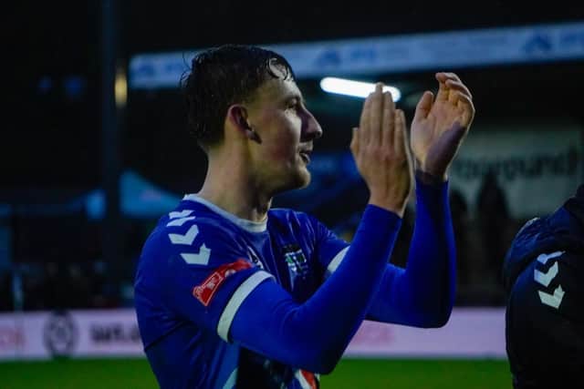 Frankie Whelan applauds the travelling Blues fans after the 0-0 draw at Hednesford. Photo by Jesse Harland