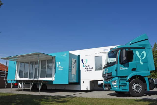 The MCU shown back on the road ready to treat local cancer patients.