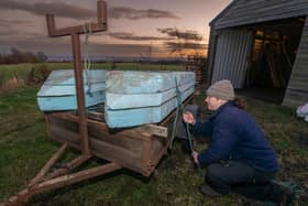 Competitor Edmund Ulliott putting the final touches to his raft and loading it onto his trailer.