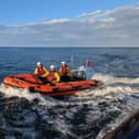 Scarborough RNLI has come to the aid of a fossil hunter cut off by the tide at White Nab - Image: RNLI/Nick Gough