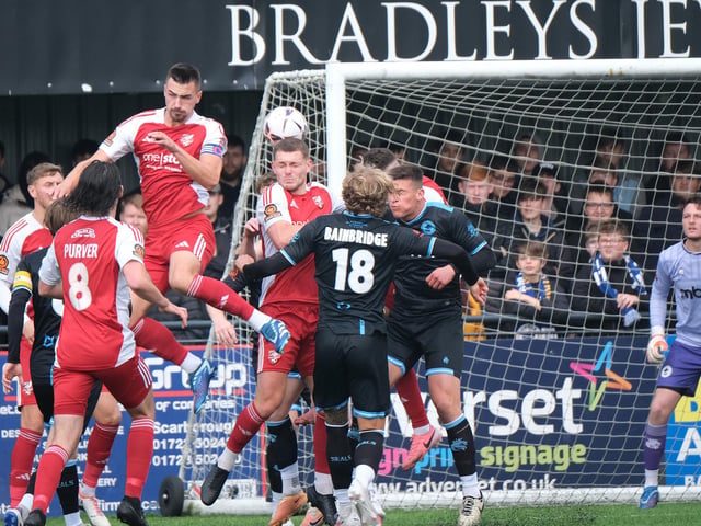 Scarborough Athletic defenders Will Thornton and Bailey Gooda rise to the task.
