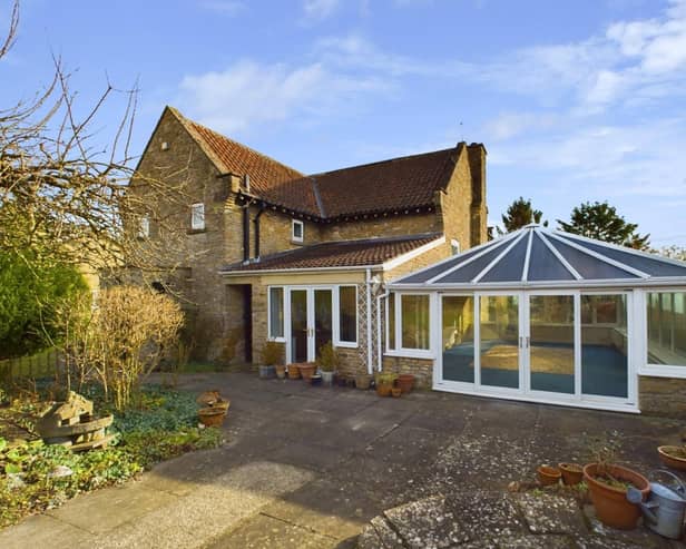 An exterior view of the property for sale in the charming village of Hutton Buscel.