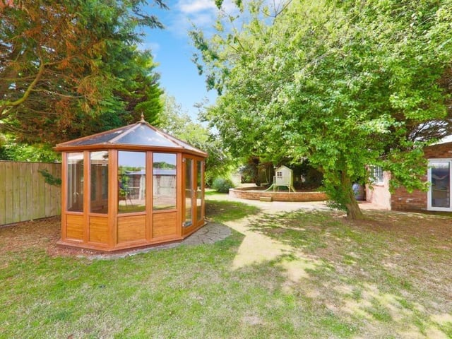 This lawned garden forms part of the attractive exterior.