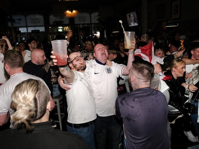 Losing the beer in celebration of Cole Palmer equalising for England.