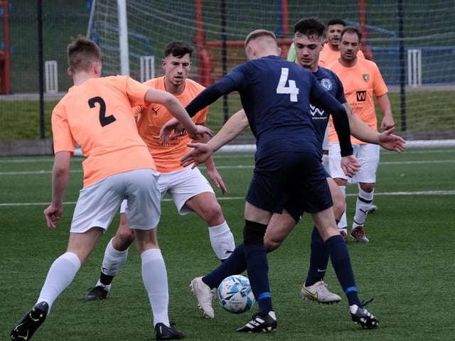 Hosts Edgehill get stuck in against Haxby in the cup quarter-final at Pindar