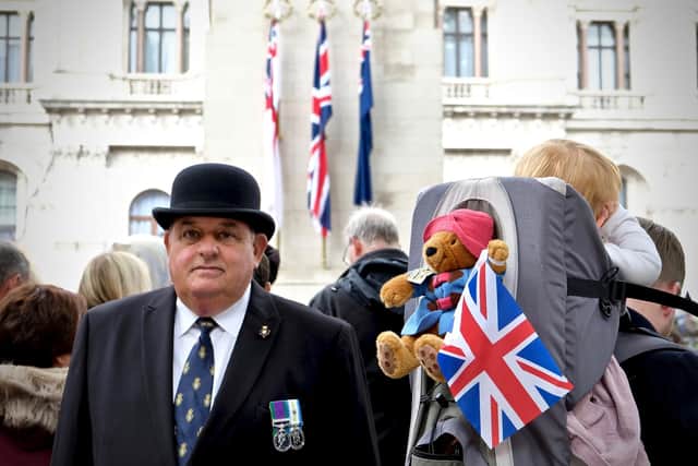 Mr. Philip Walden, Chairman of the ceremonial working committee of the Royal British Legion stands in front of The Cenotaph on Whitehall.