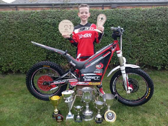 Rudston's Josh Tate shows off some of his trophies