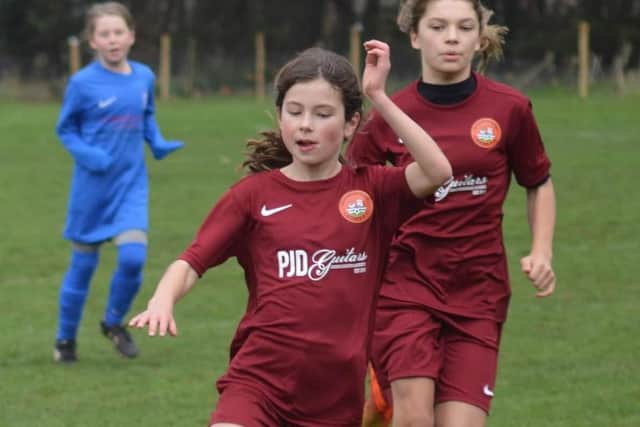 Poppy Timmins in action for Scarborough Ladies Under-12s Reds
