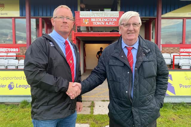 Jon Tindall, left, the new Bridlington Town FC vice-chairman, is welcomed by Seasiders chairman Pete Smurthwaite. PHOTO BY DOM TAYLOR