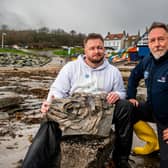 Mark Kemp, known as The Yorkshire Fossil Hunter, with Andy Monaghan, Community Safety Volunteer for the RNLI based at Staithes and Runswick Lifeboat Station with a 180 million-year-old Ichthyosaur fossil Mark found.
Picture by James Hardisty